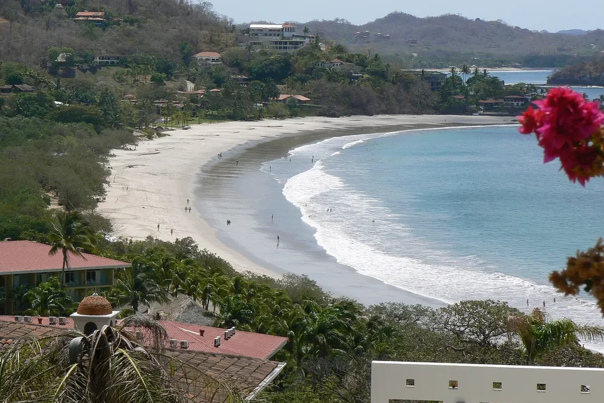 Turquoise water and white sand beach along the Playa Flamingo and Conchal coastline